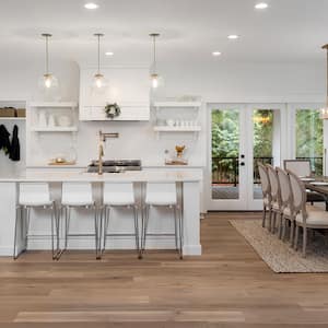 luxury kitchen area with wood flooring  